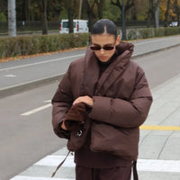 Korina - Puffer jacket with belt