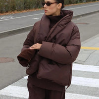 Korina - Puffer jacket with belt