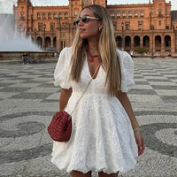 Ellie - Elegant mini dress with puff sleeve