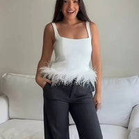 Cara - Flattering top with feather detail